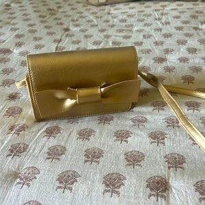 Like new gold purse. Used once. Smoke free home.
